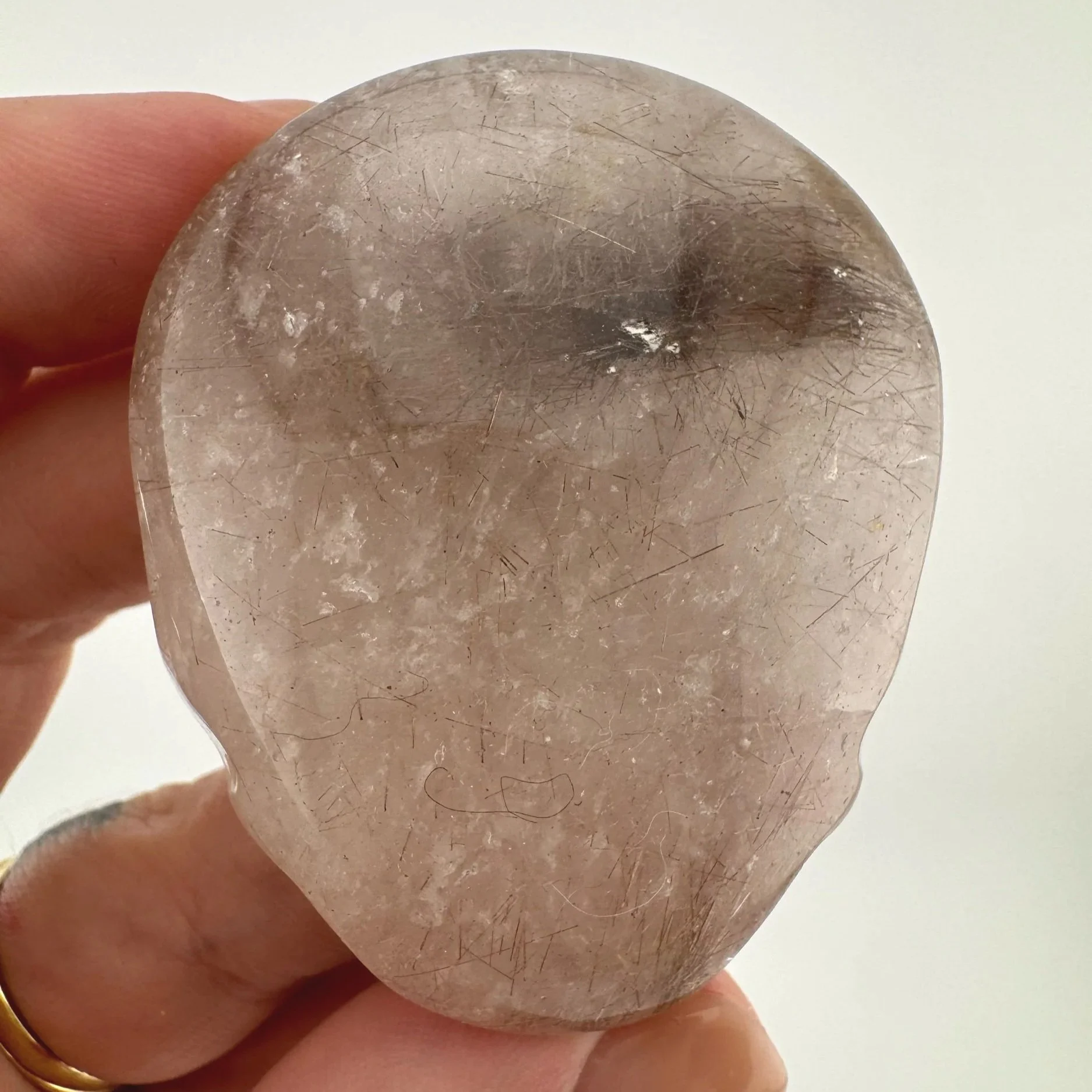 Leandro de Souza Red Rutile in Quartz Palm Skull