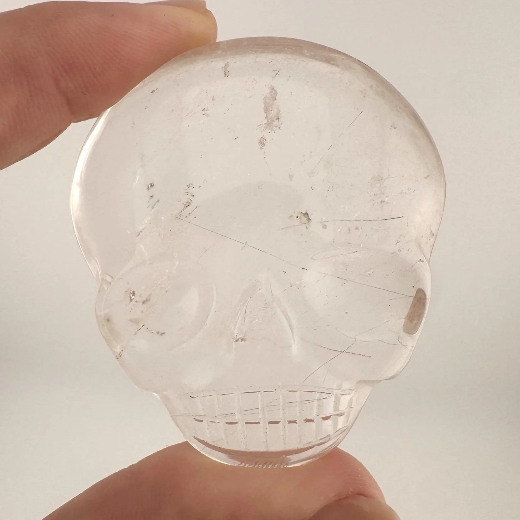 Leandro de Souza Red Rutile in Quartz Magical Child Palm Skull