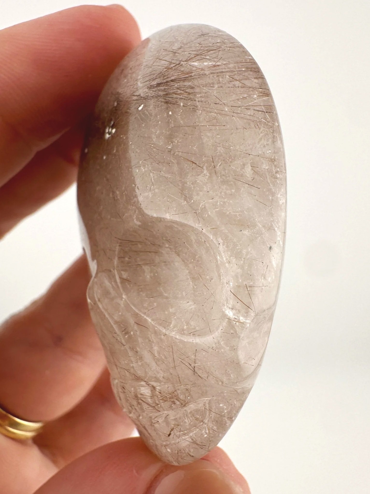 Leandro de Souza Red Rutile in Quartz Palm Skull