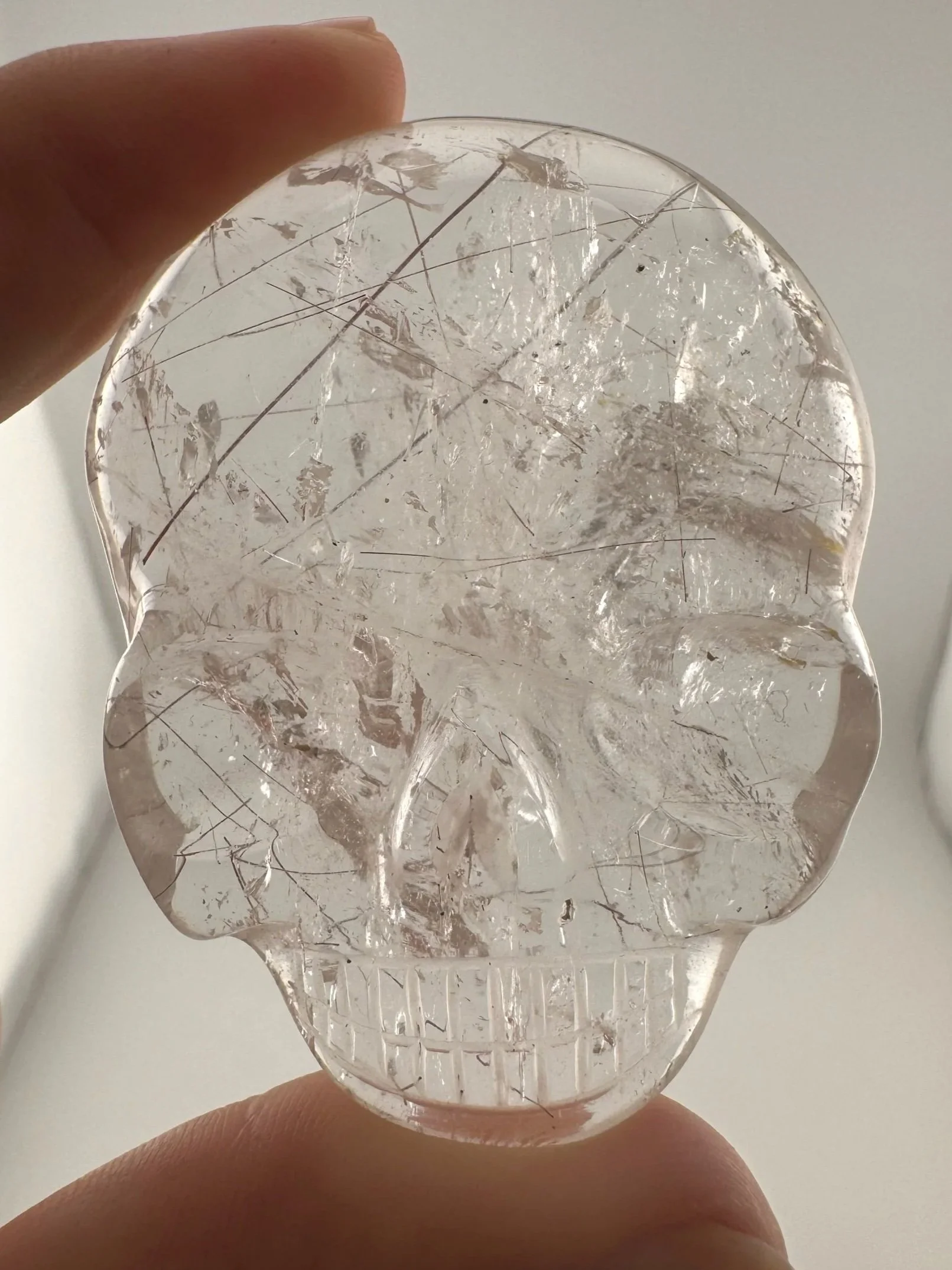 Leandro de Souza Red Rutile in Quartz Magical Child Palm Skull