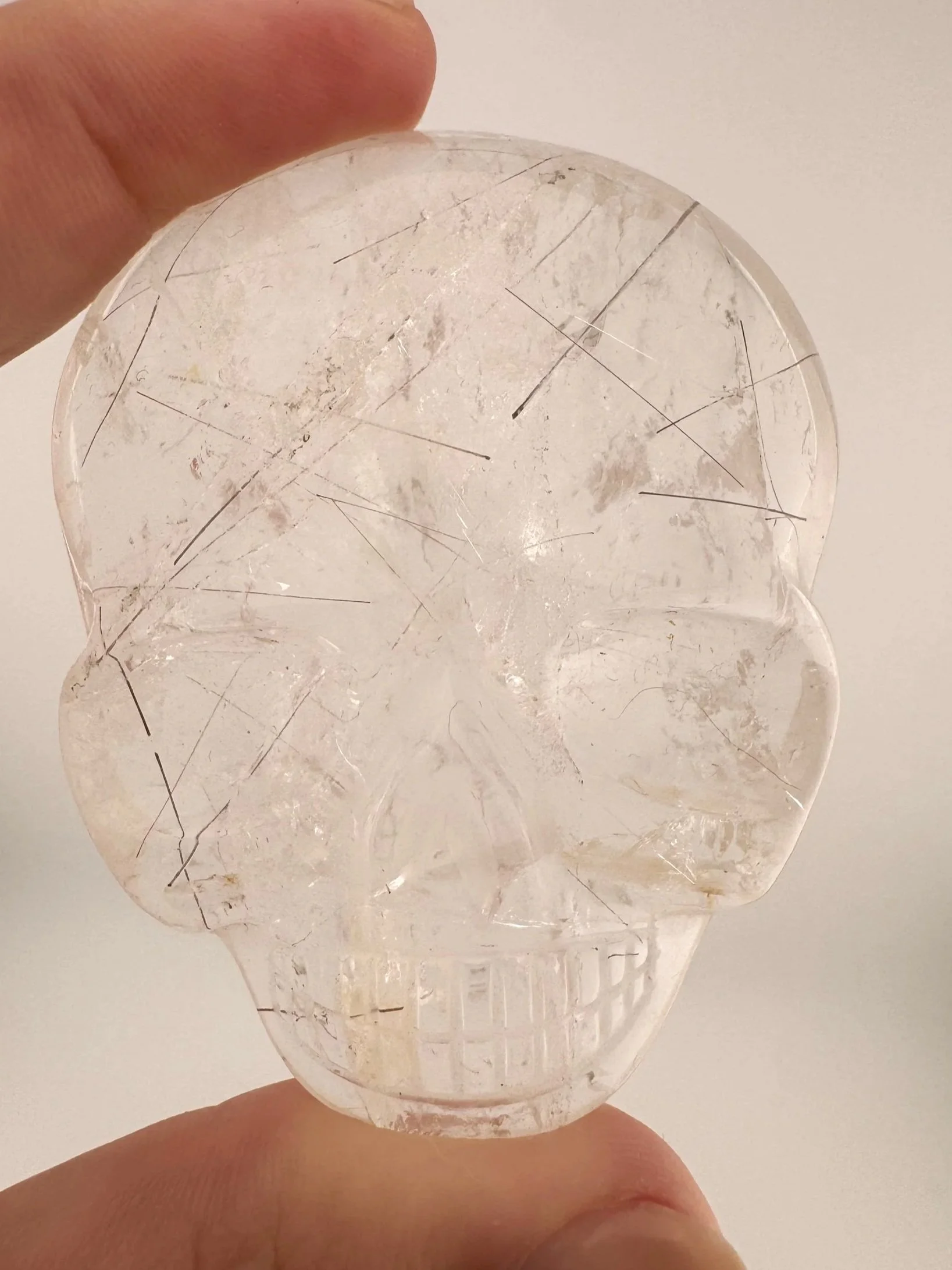 Leandro de Souza Red Rutile in Quartz Magical Child Palm Skull