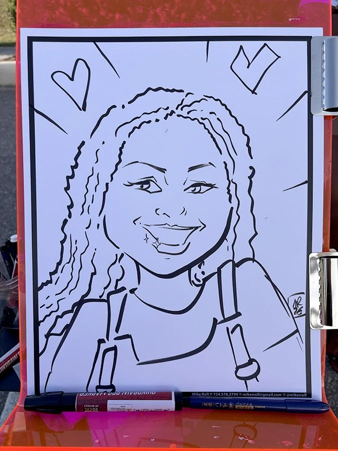 Line drawing of a woman smiling, with long wavy hair, wearing a top with straps, and two hearts in the background.