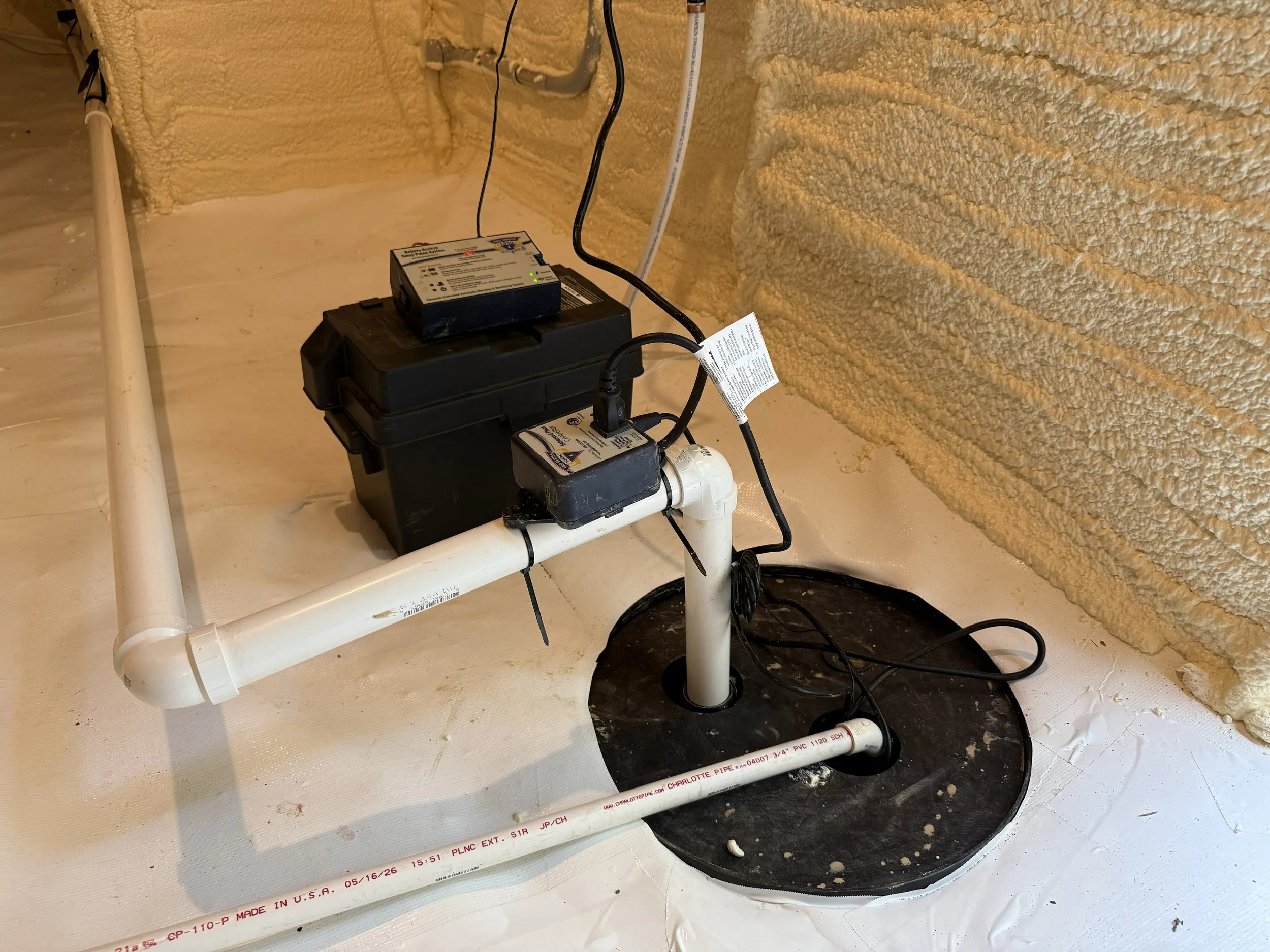 French drains connected to sump pump with battery backup to protected the foundation.