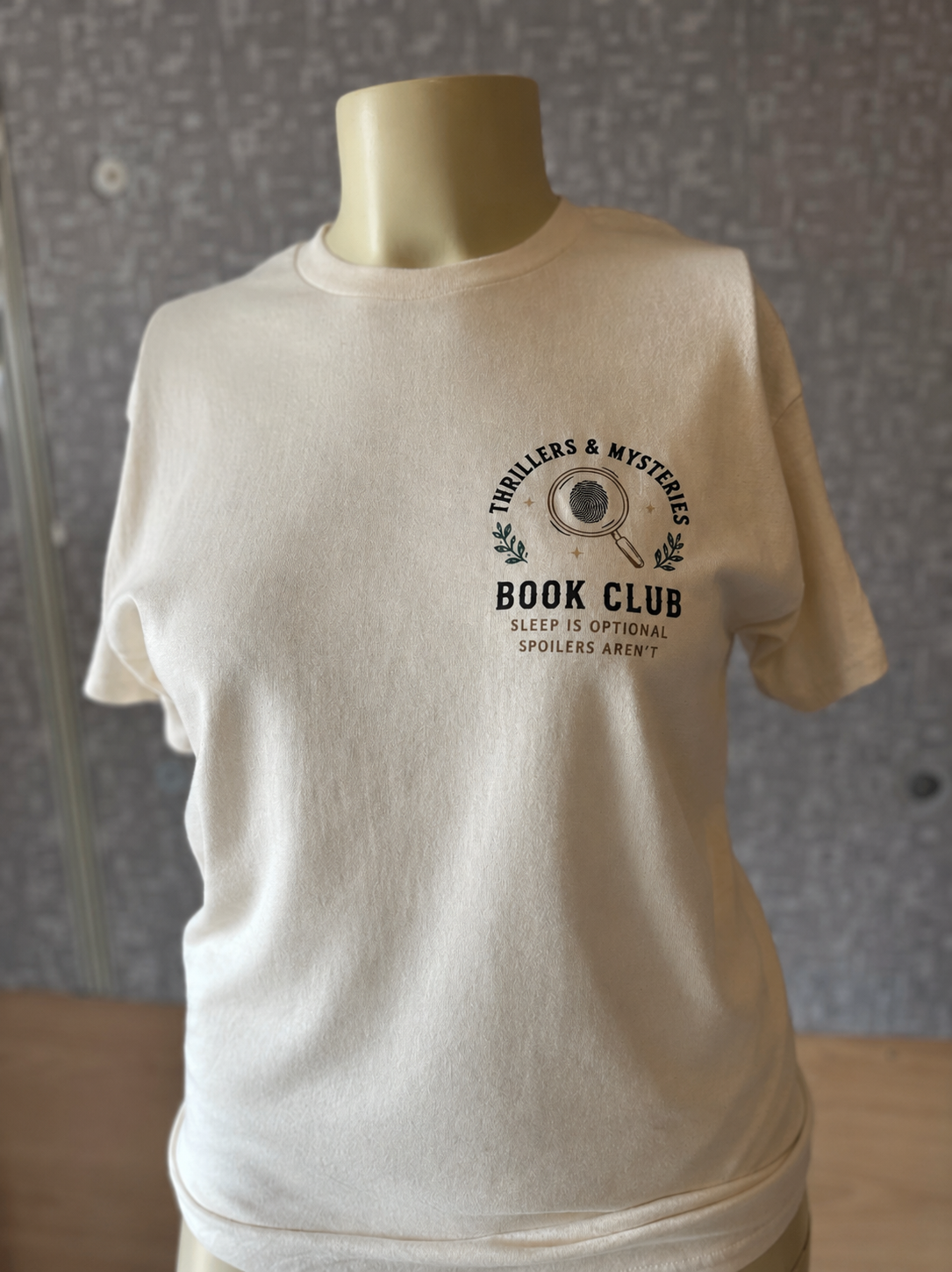 Thrillers and mysteries cream tee.png