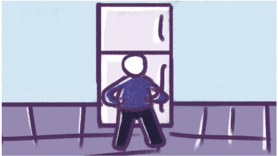A person standing in front of an open refrigerator in a kitchen.