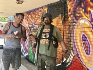 Mural Commemorates Neighborhood Barbershop - The Advocate (June 12, 2018)