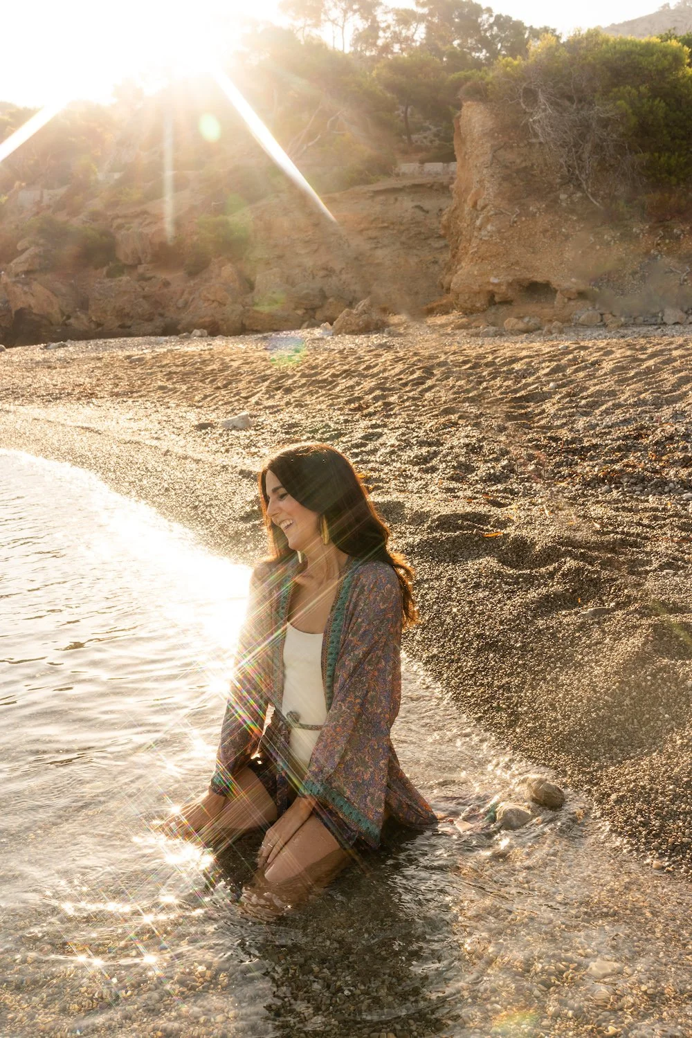 Woman kneeling in water | Nichole MCH Photography