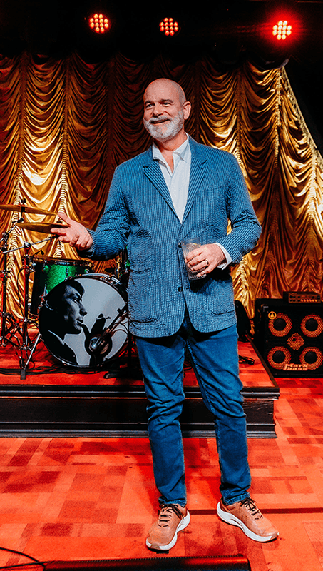 Johnny Anderson speaking at a corporate event or strategic retreat