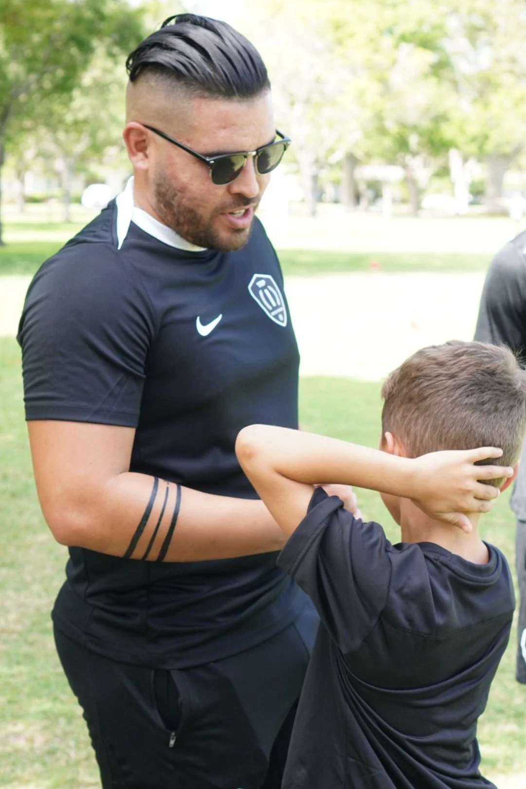 Coach Christian Acevedo leading a high-performance soccer training session in Cutler Bay.