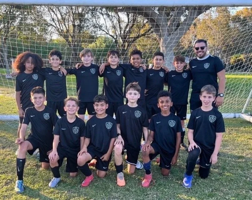 Players and coaches training and participating in the Top 1 Soccer Training spring soccer camp at Coral Reef Park in Miami, Florida.