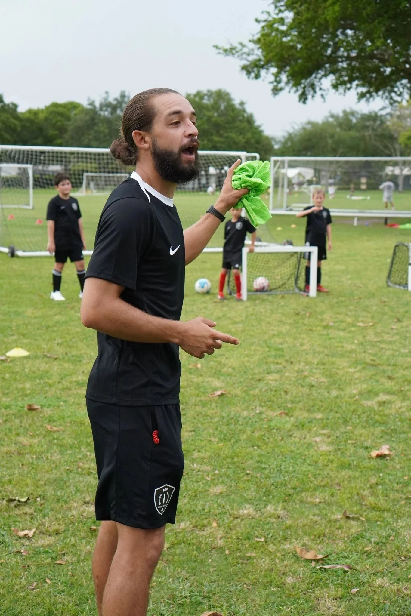 Coach Erikk Ordonez developing young athletes at a Top 1 Soccer Training Soccer Camp.