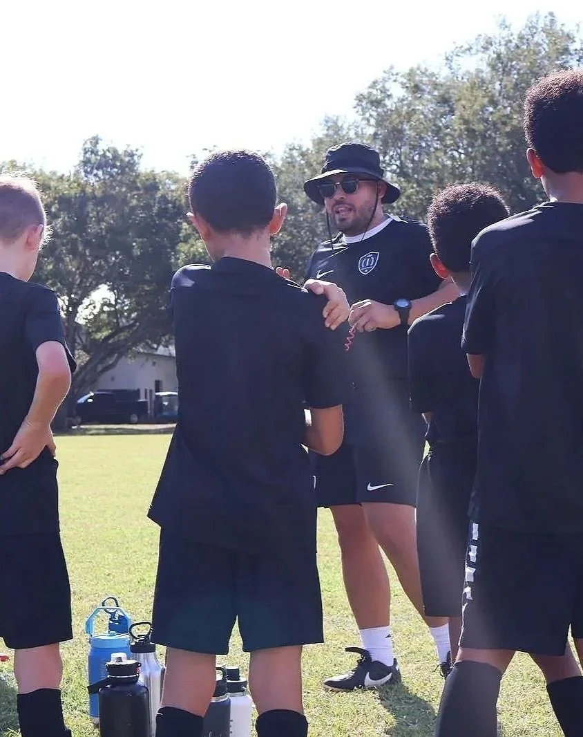 Coach Christian Acevedo leading a high-level of professional soccer training session in Miami, FL.
