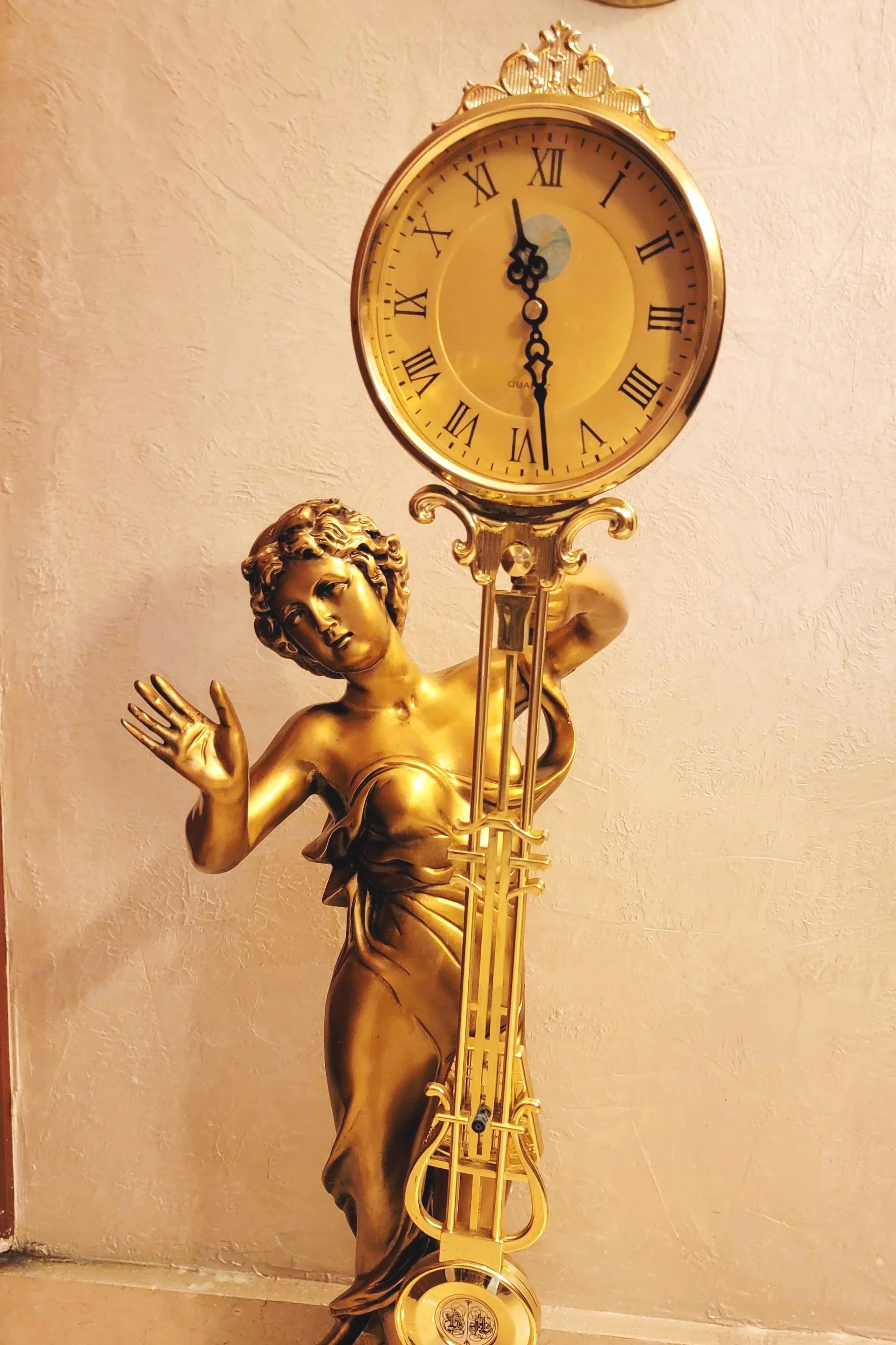 Neoclassical Bronze Statue with Clock