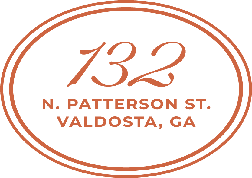 Society House business address written inside an oval shape: 132 N. Patterson St. Valdosta, GA