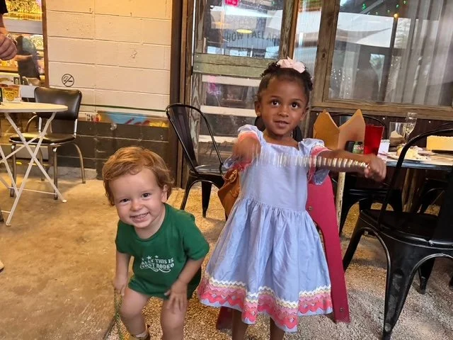 Ayla and Caio playing at Lil'Easy