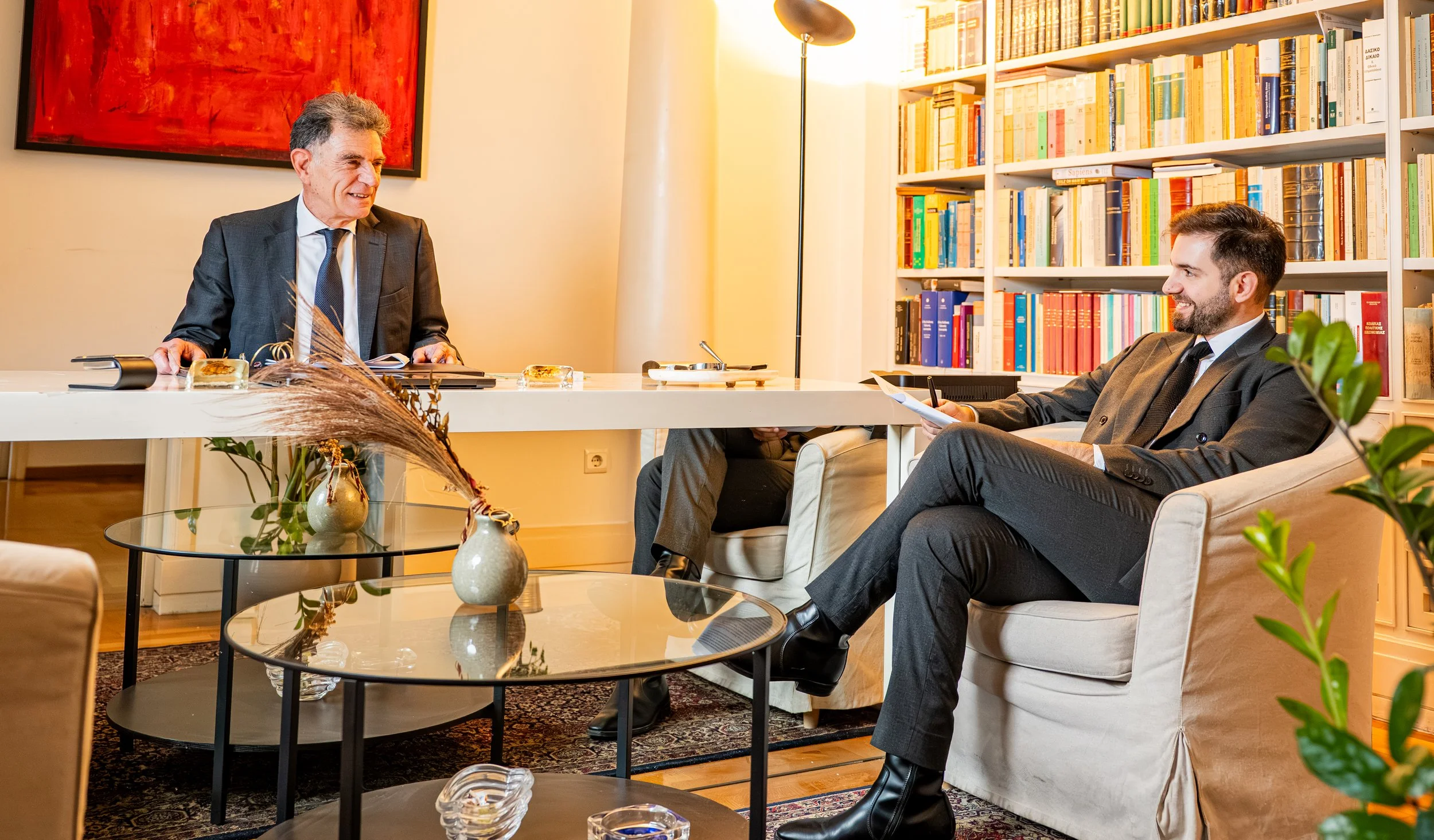 Nikolaos and Evangelos Moschos sitting in their office