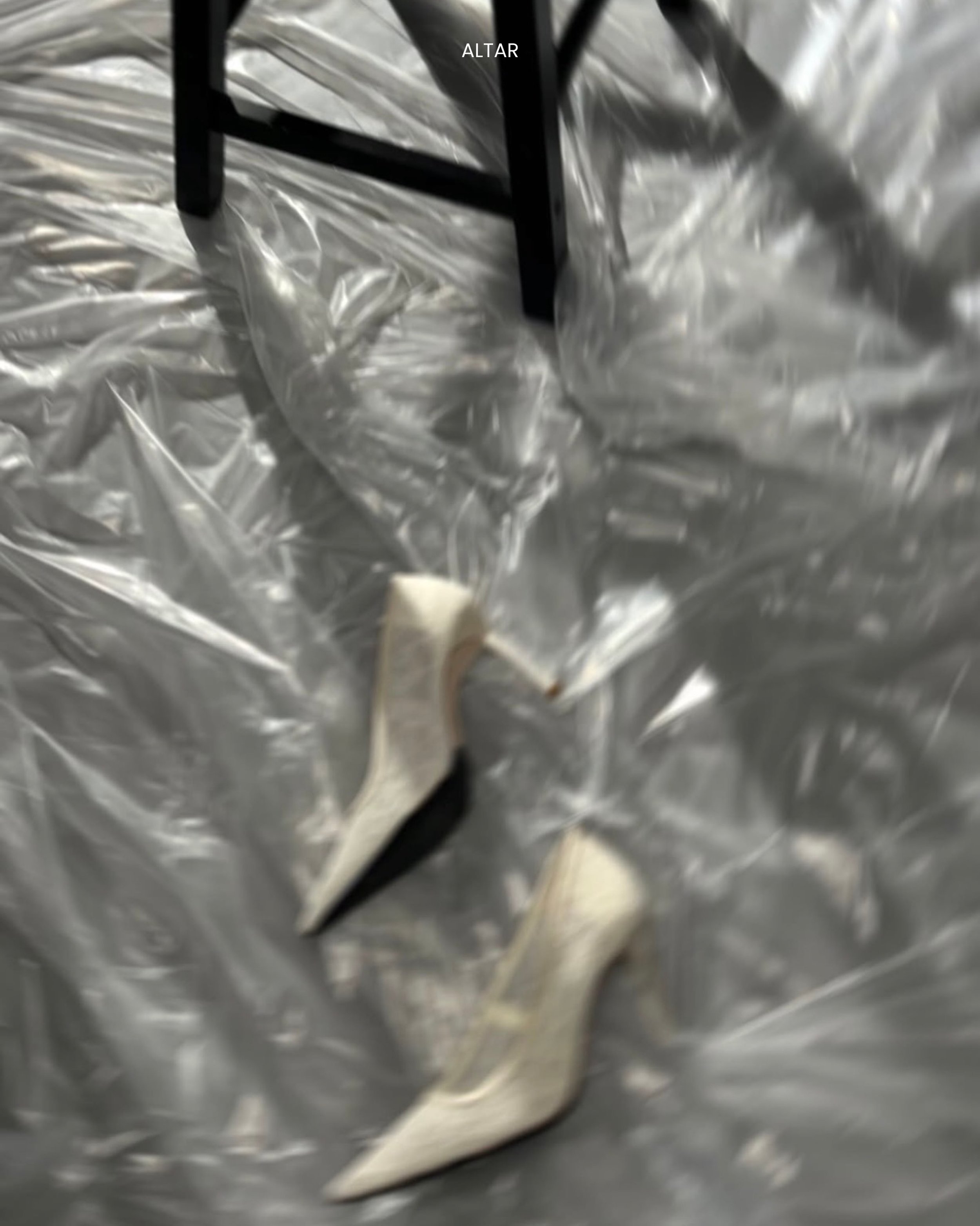 An image begins turning strange long before it becomes finished.

Lace on top of plastic. Shoes kicked off in haste. A body visible but not entirely reachable.

A detail from the making of Portals.
