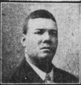A head shot photo of Tom Turpin, the only known photo that clearly shows his face. He's wearing a suit coat, white shirt and tie.