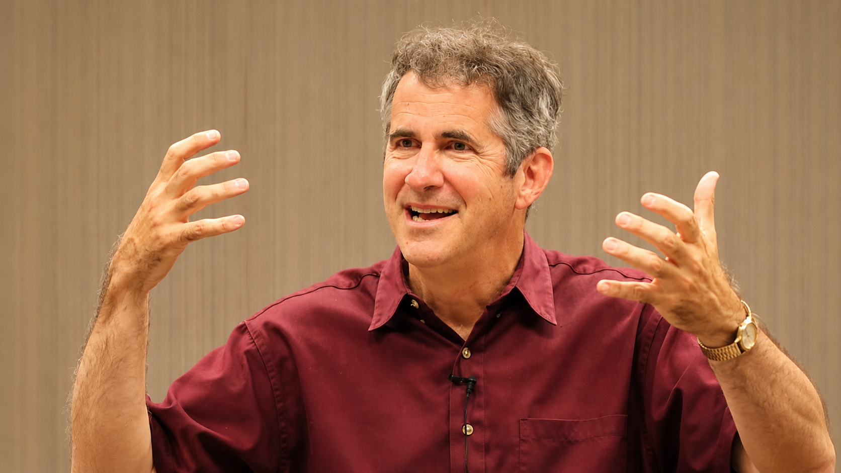 David teaching at AHA conference - both hands.png