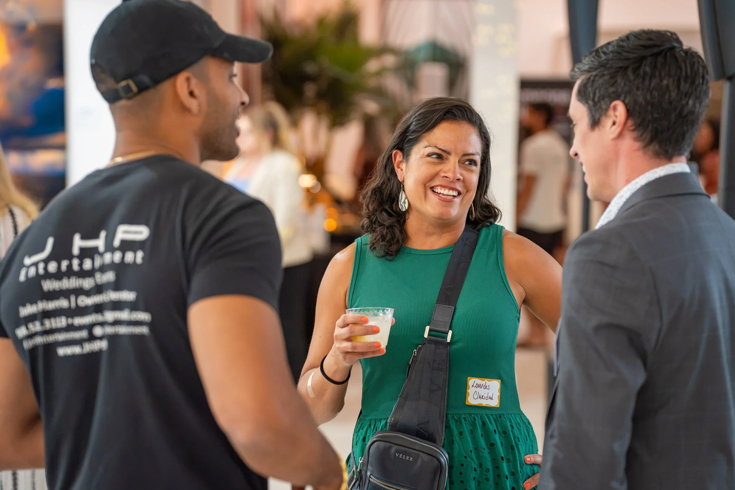 An art gallery interior featuring black-and-white photographs on the wall, for networking, corporate events, and professional gatherings at La Casa Studios event venue
