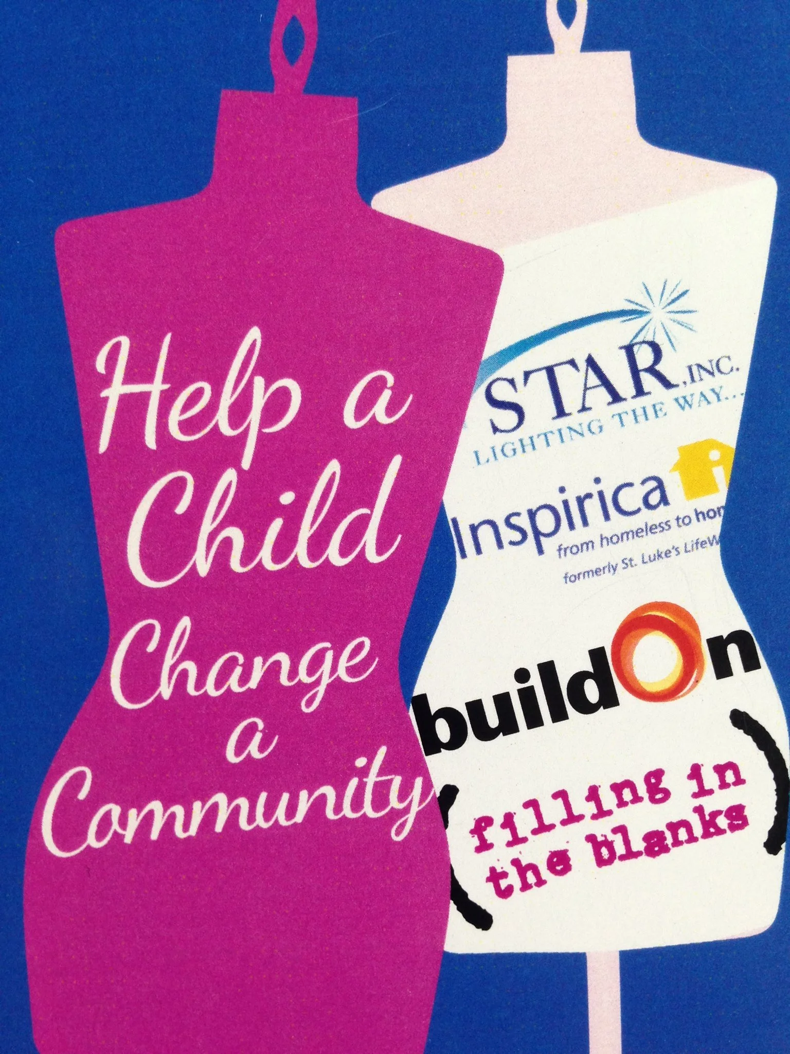 A pink and white sign featuring a candle and a message encouraging asking for help in the community.