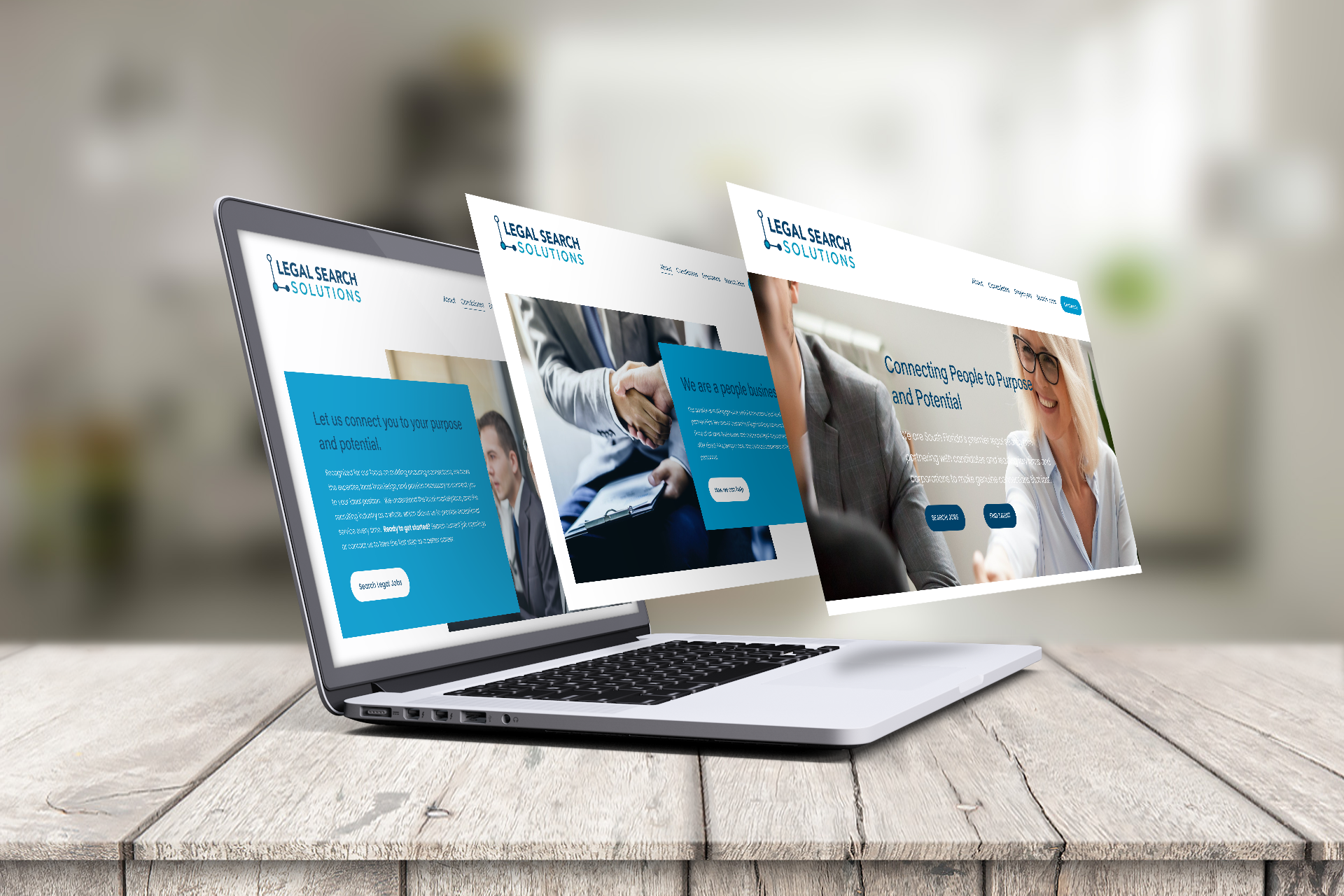 Laptop on a wooden surface displaying a website for Legal Search Solutions with images of professionals and text about connecting people to their purpose and potential.