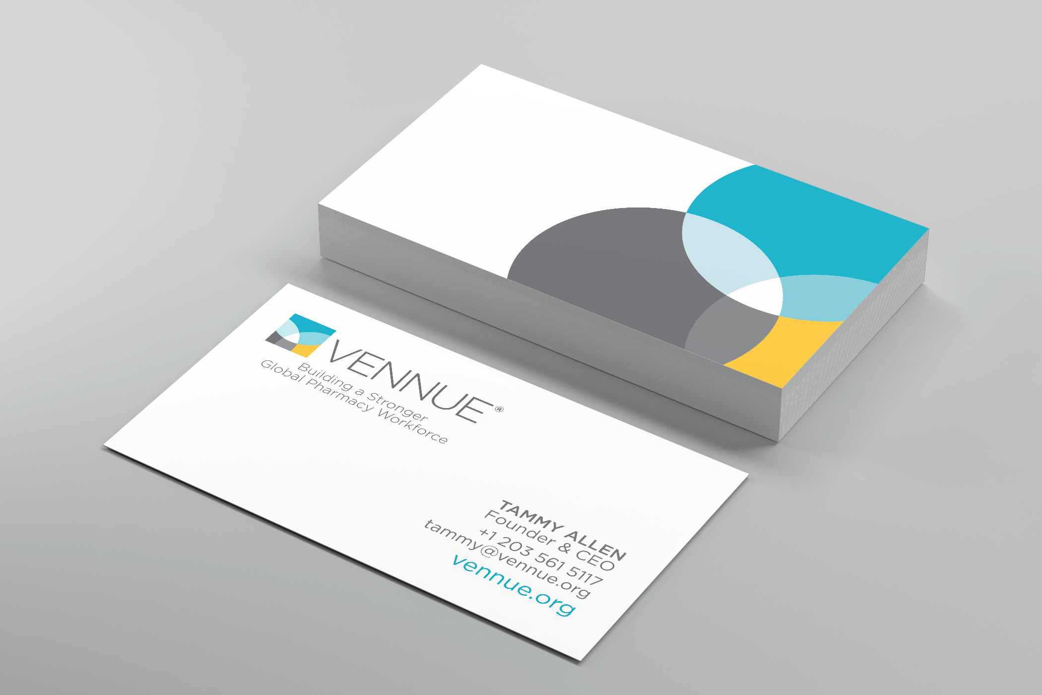 A business card and a white paper with a colorful emblem and the text 'Vennue'. The business card includes contact information for Tammy Allen, founder and CEO, with a website URL 'vennue.org'.