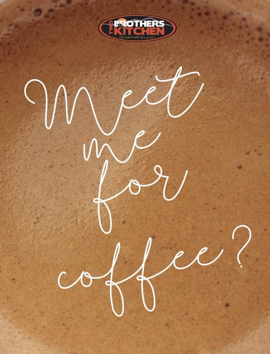 Close-up of a coffee cup with a foam surface and the text 'Meet me for coffee?' written on it, and a logo at the top that reads 'Two Brothers Kitchen Breakfast & Lunch'.