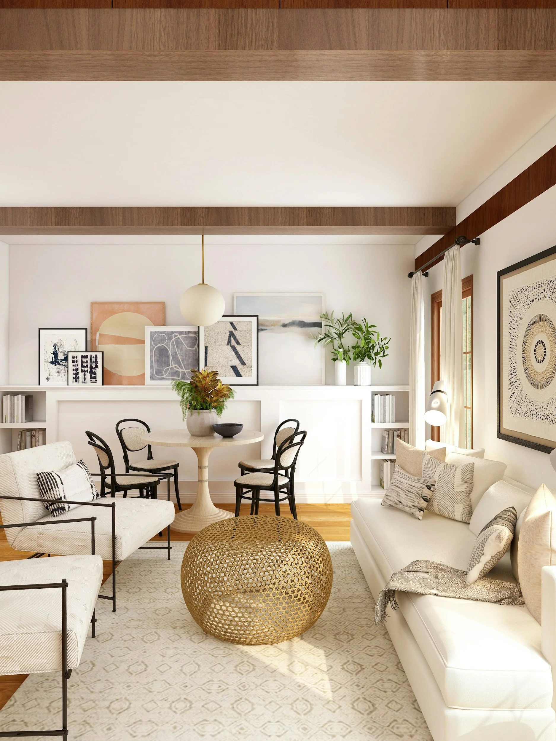 Living room with white sofas, black chairs around a wooden table, a large woven ottoman, artwork on the walls, green plants, and large windows with white curtains.