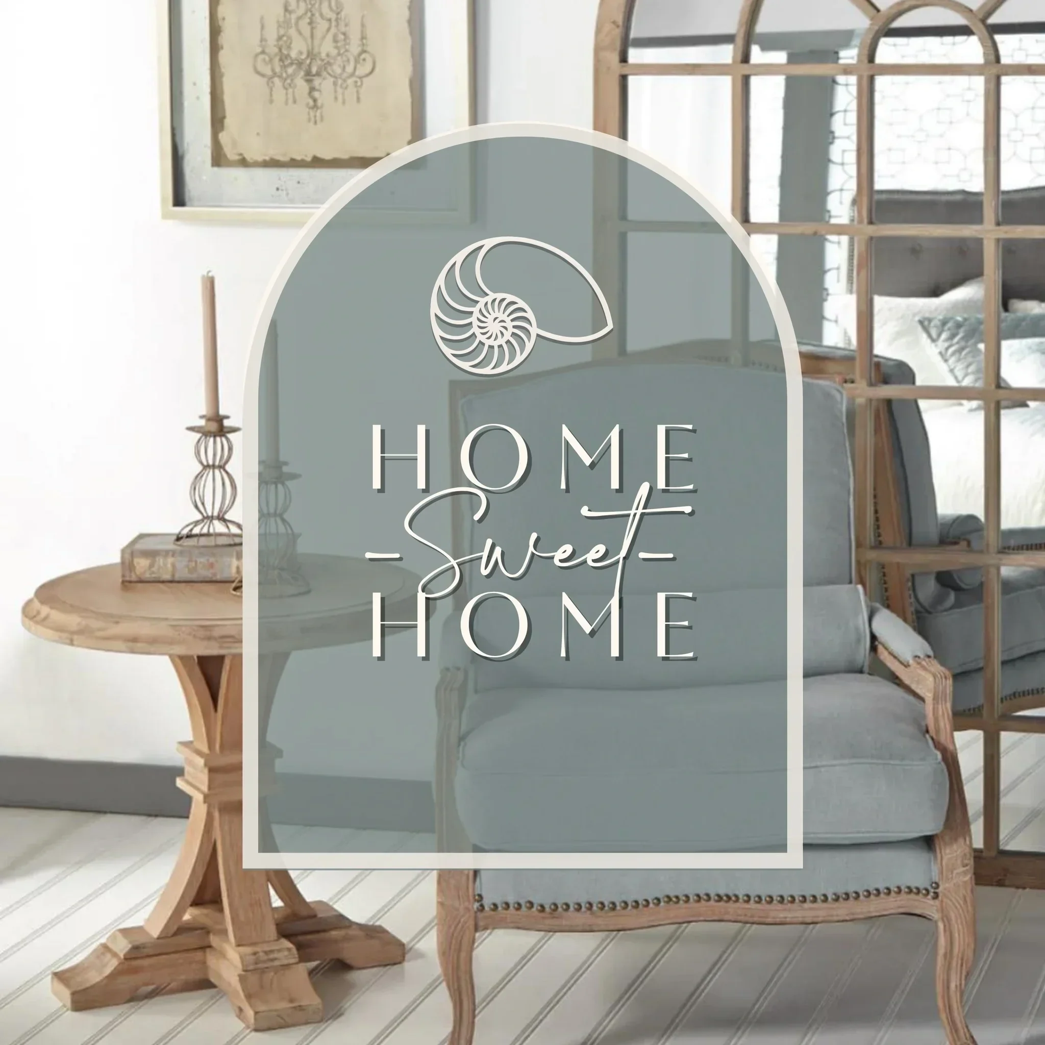 A rustic bedroom with a wooden lattice bed frame, bedding, and large windows, with a mirror with a carved wooden frame and a wall-mounted artwork in the background.