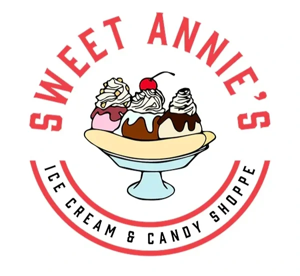 A logo for Sweet Annié's Ice Cream & Candy Shop featuring a bowl of four ice cream scoops topped with whipped cream and a cherry.
