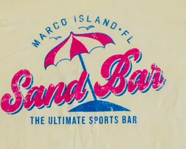 Logo for Marco Island Sand Bar, featuring a pink and white beach umbrella, with the text "Marco Island Sand Bar" and "The Ultimate Sports Bar" in blue.