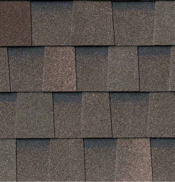 Atlas StormMaster® Shake roofing shingles in Weathered Wood with a textured architectural design.