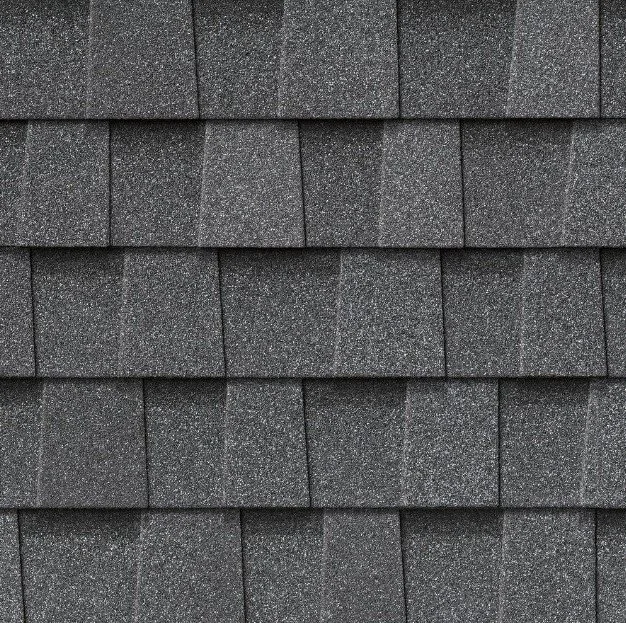 Atlas StormMaster® Shake roofing shingles in Pewter with a textured architectural design.