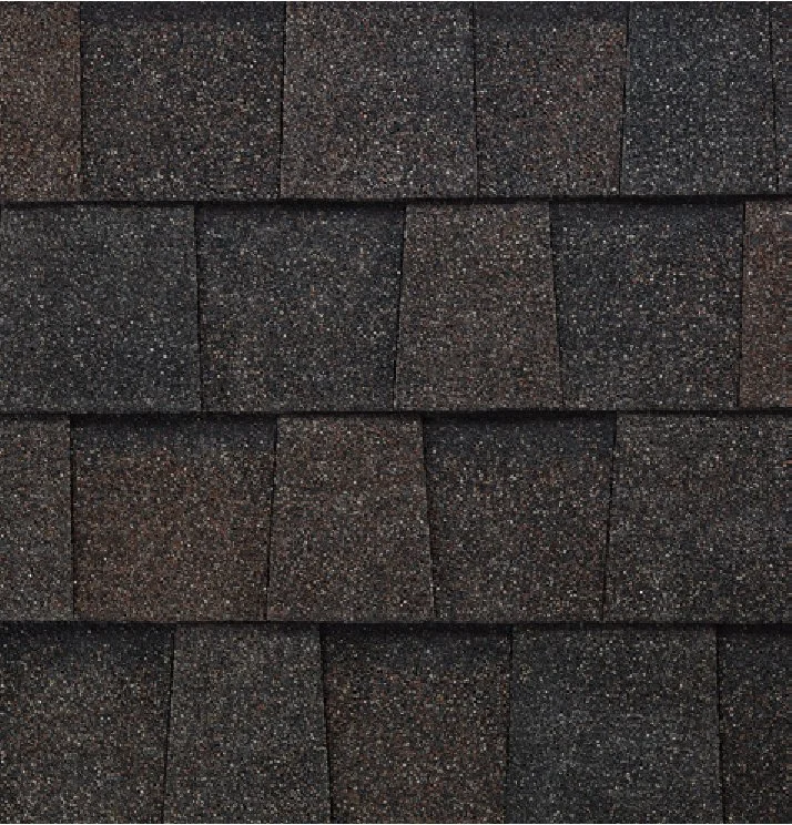 Atlas StormMaster® Shake architectural roofing shingles in Midnight Lake with a dimensional textured design.