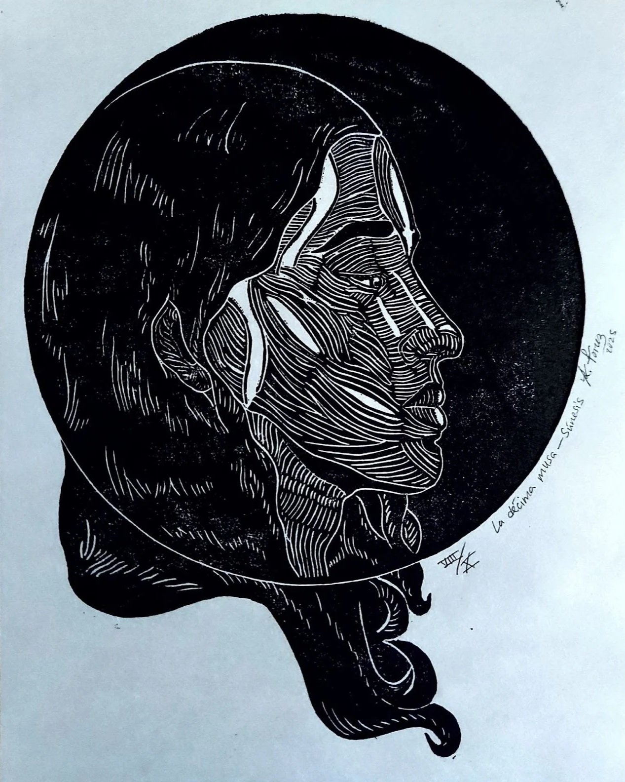 Black and white artwork of a woman's profile, with hair flowing downward and a circled background. The illustration emphasizes the profile's facial features and hair.