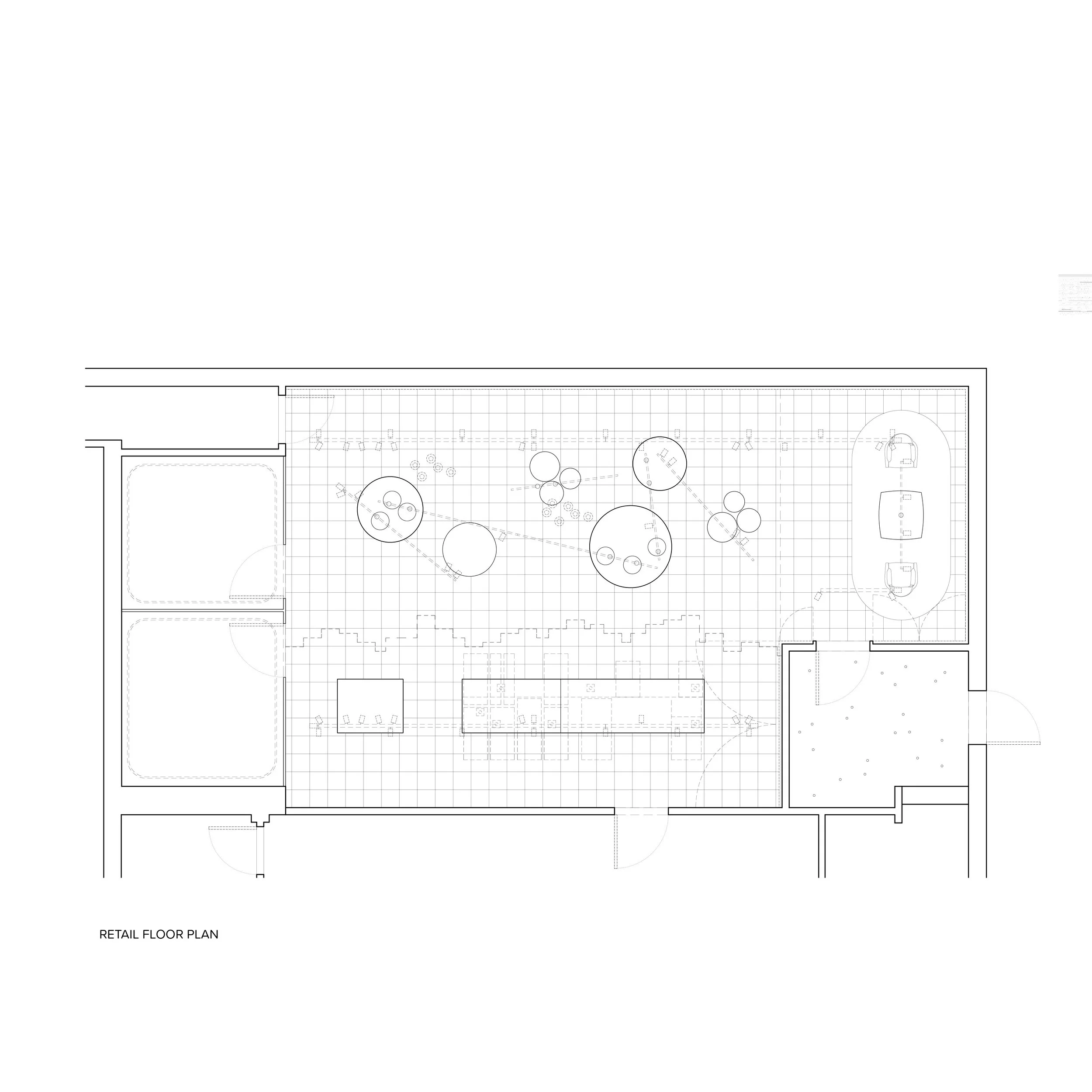 Architectural blueprint of a retail floor plan, showing various store layouts, seating areas, and parking spaces.