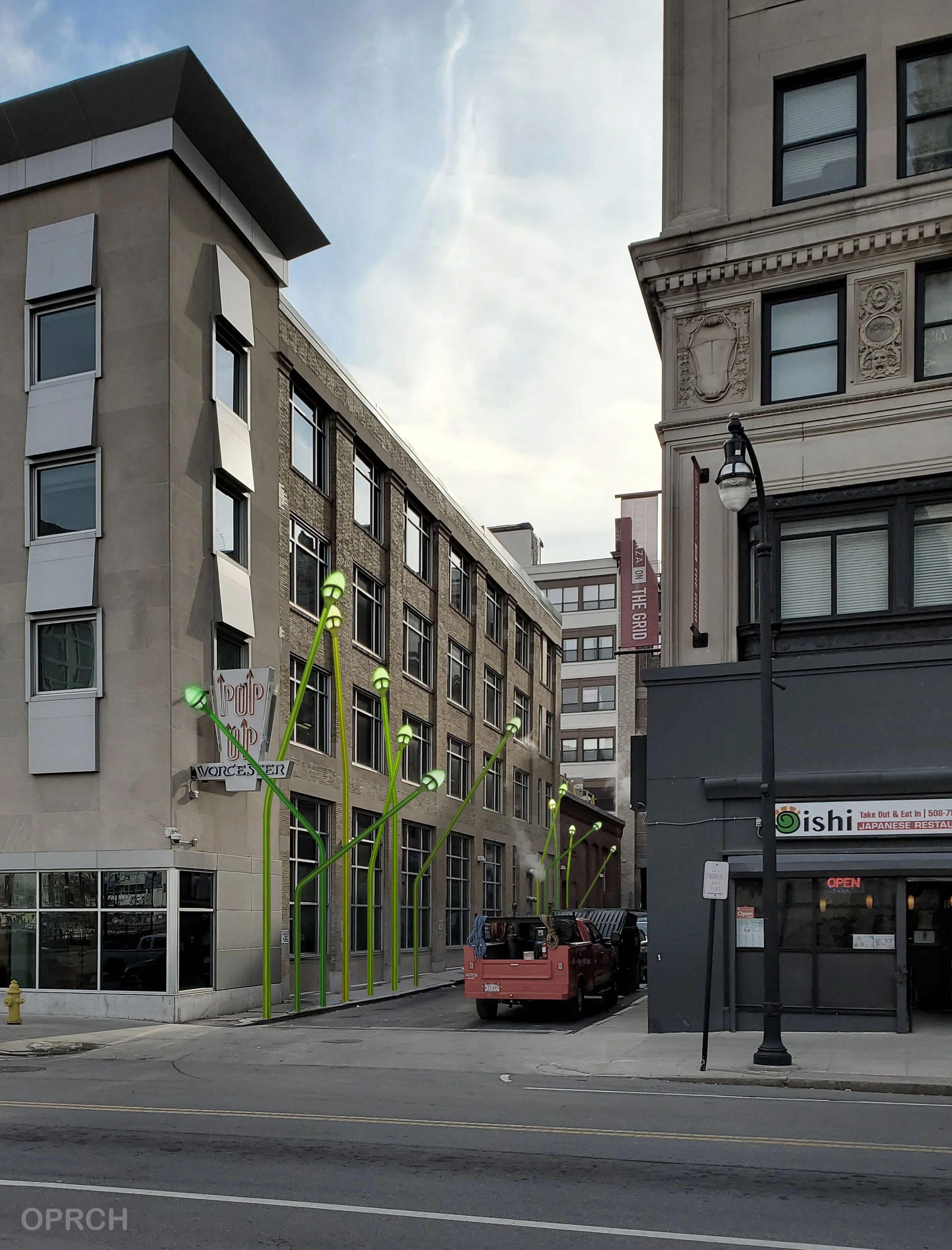 City street scene with modern and historic buildings, a red truck parked on the street, green decorative streetlights, and signs for businesses, including a Japanese restaurant and a pop-up shop.