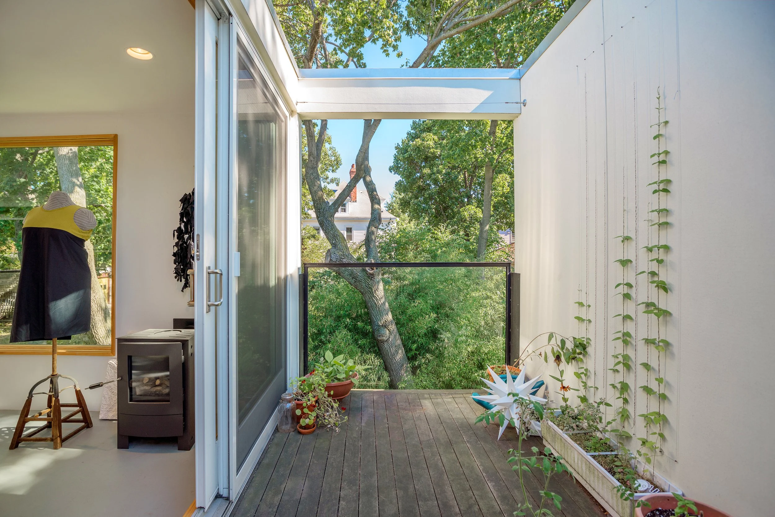   Artist Loft     I        An attic space is converted to an art studio set in the treetops