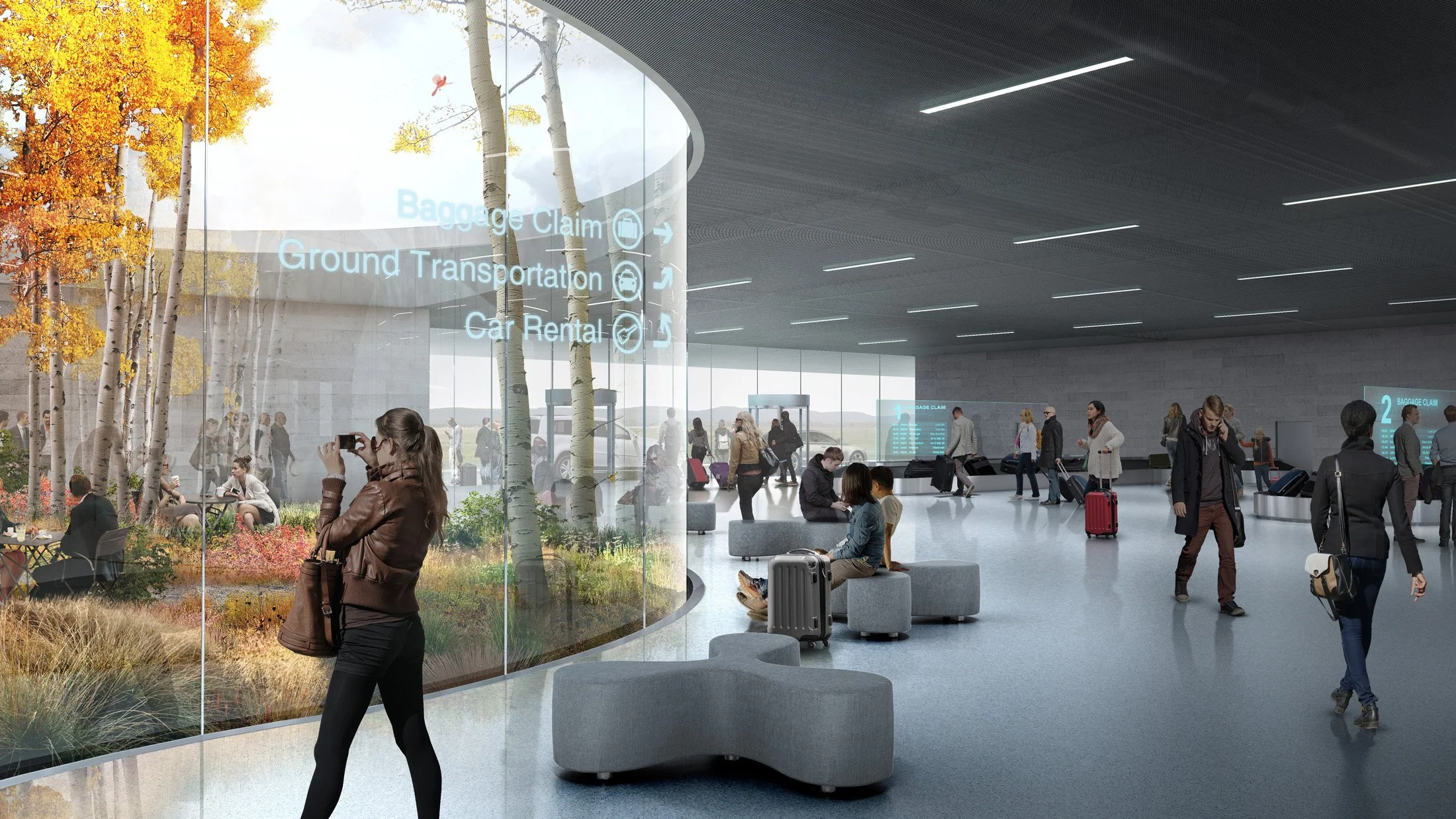 Airport baggage claim area with travelers walking and sitting with their luggage, large digital screens on the walls, and a glass wall showing an outdoor scene with trees and people.