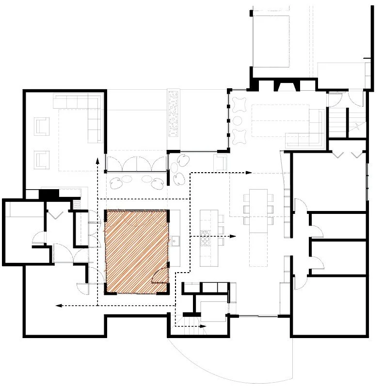 Floor plan of a residence showing various rooms including a kitchen, living area, dining area, and outdoor spaces, with an orange shaded area indicating an enclosed outdoor courtyard.