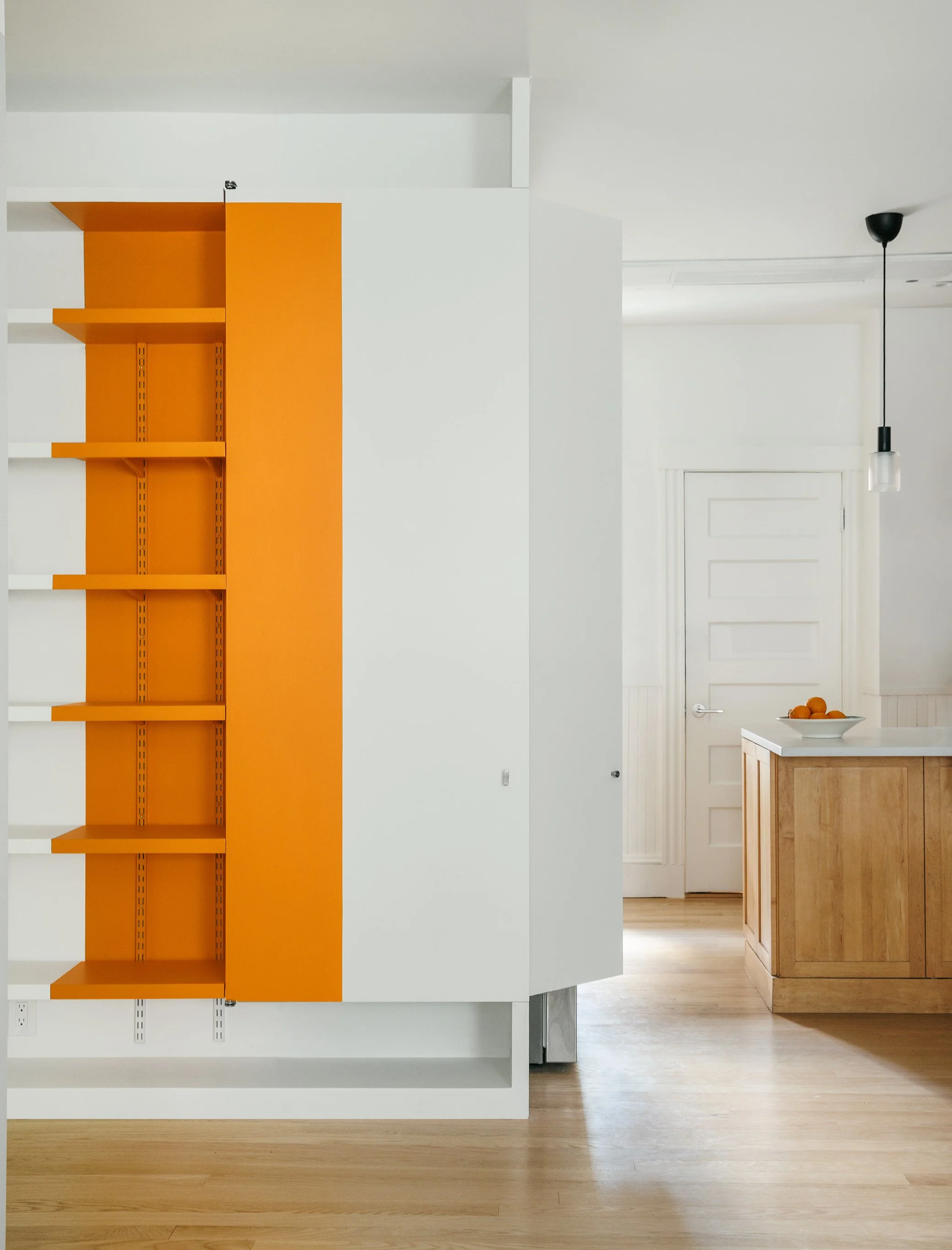   Brookline Condo      I        A family home built around a love of books and art, with a library of light and color at its center