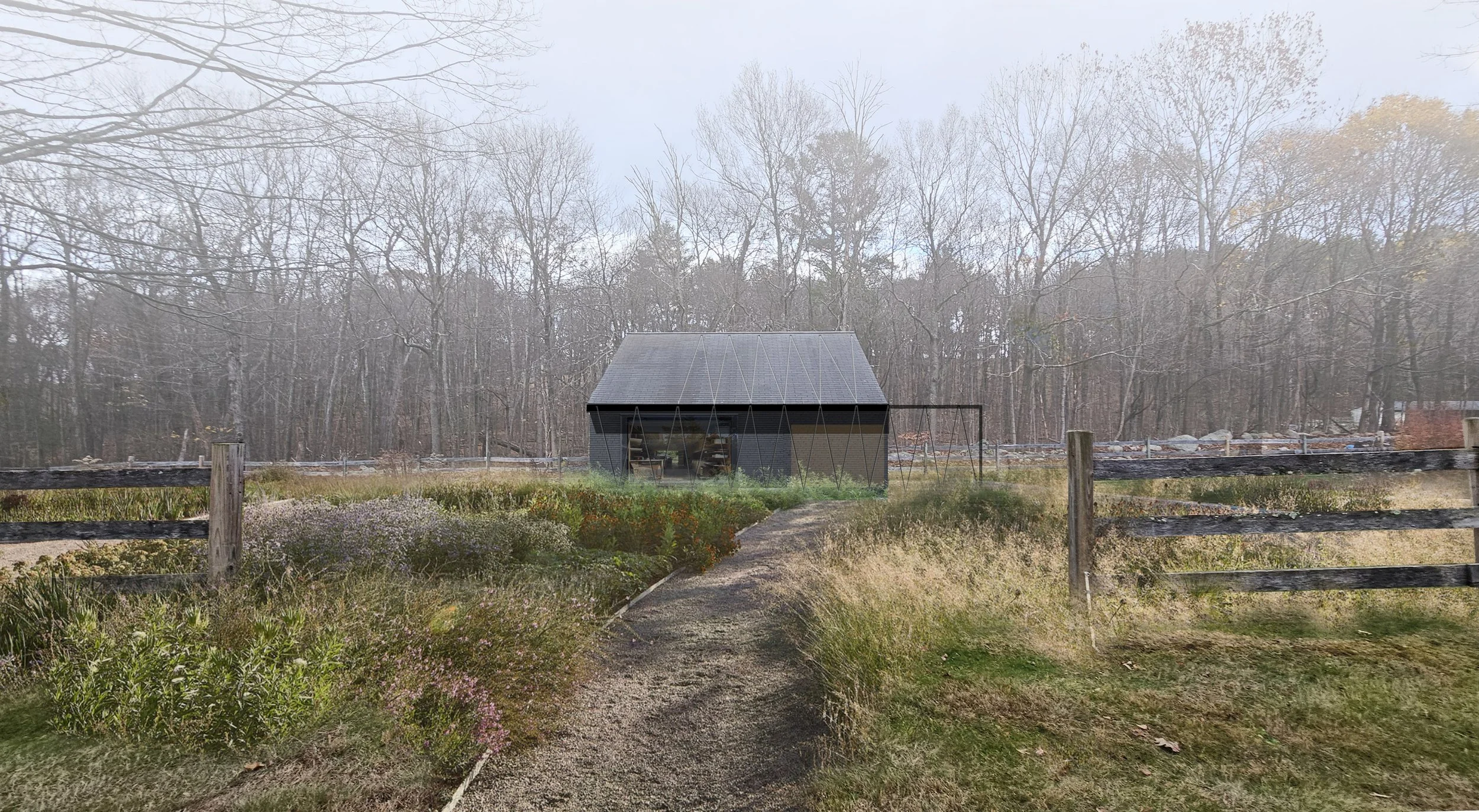 A small, dark, contemporary art studio repurposed from an existing shed with a sloped roof located in a field with a gravel pathway, surrounded by a wooden fence, trees, and colorful plants.