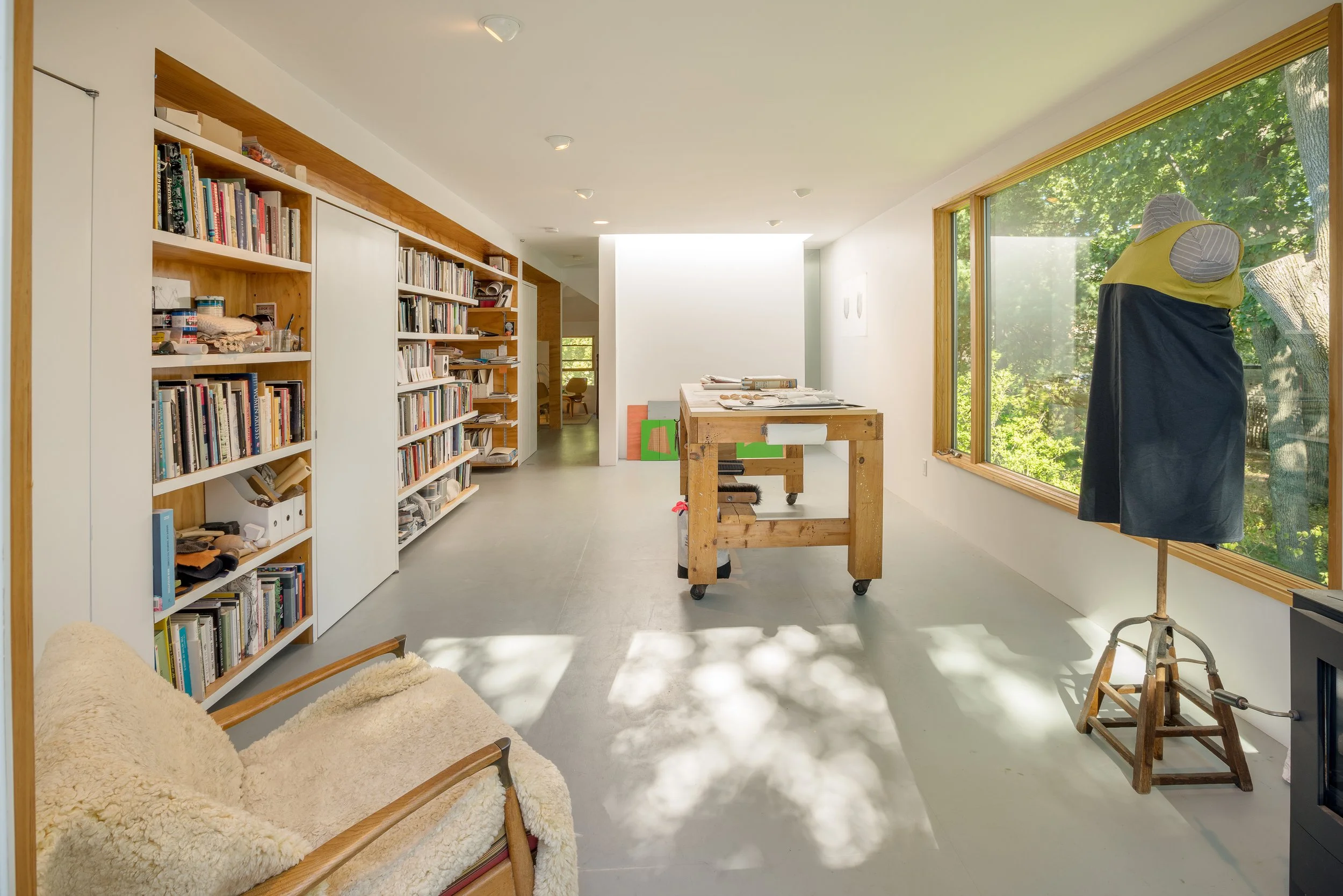   Artist Loft     I        An attic space is converted to an art studio set in the treetops