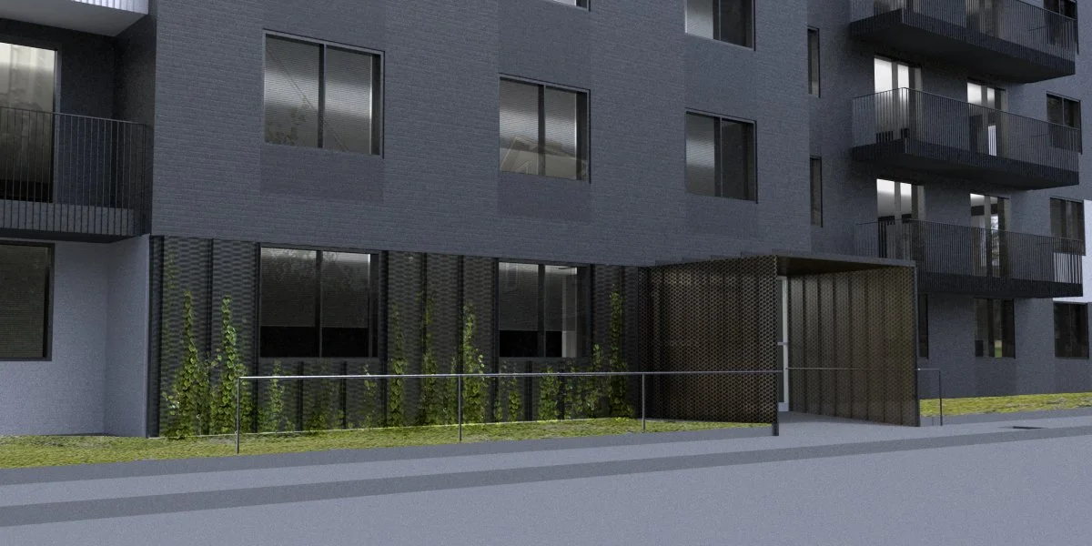 Modern dark gray apartment building with glass windows and balconies, small landscaped area with plants, and a dark entrance with a textured facade.