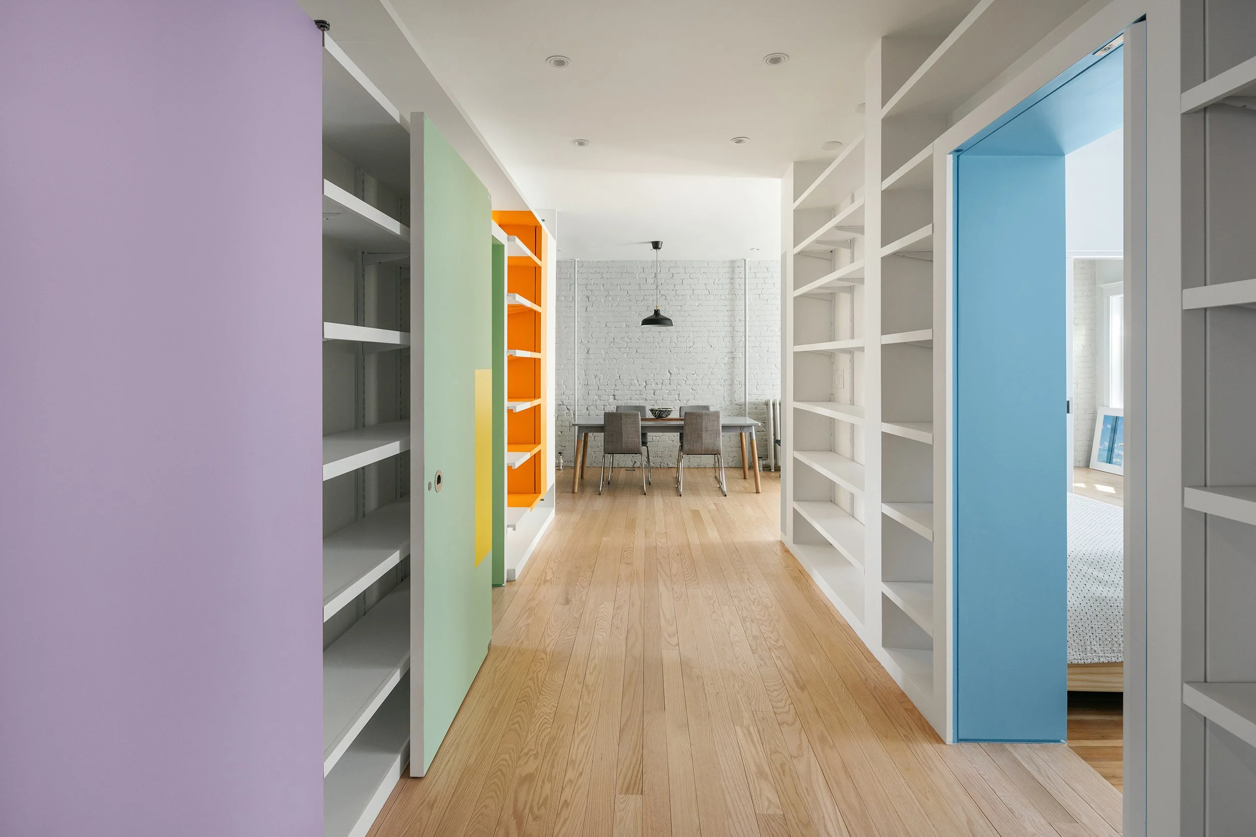   Brookline Condo      I        A family home built around a love of books and art, with a library of light and color at its center