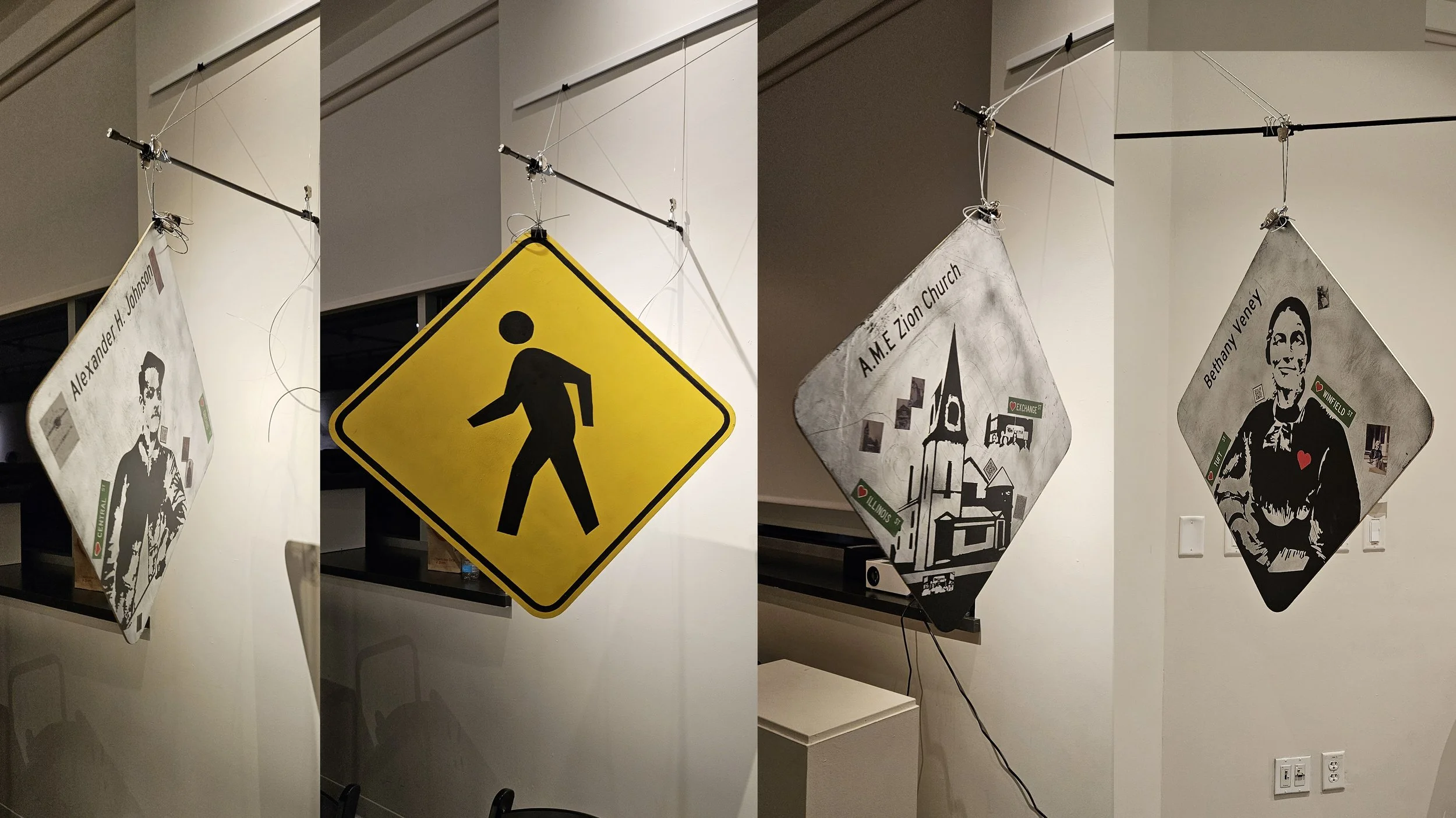 Multicolored collage of four signs on a wall. The first sign features a portrait of a woman with the name Alexander H. Johnson. The second sign is a yellow pedestrian crossing sign. The third sign is a black and white sketch of a church with the name