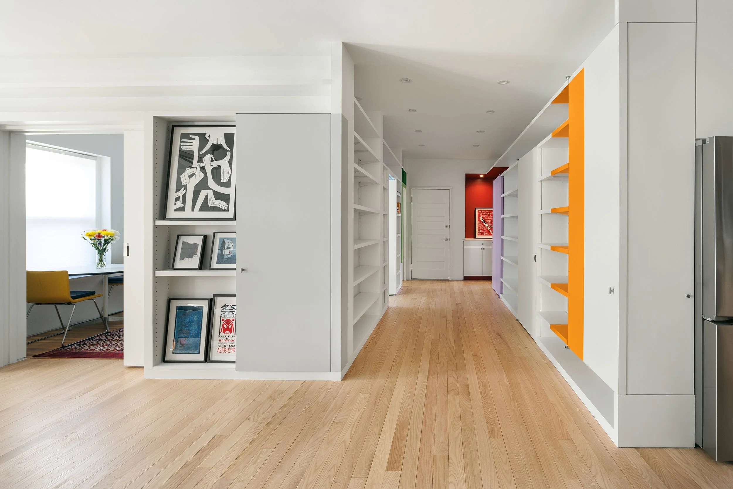   Brookline Condo      I        A family home built around a love of books and art, with a library of light and color at its center