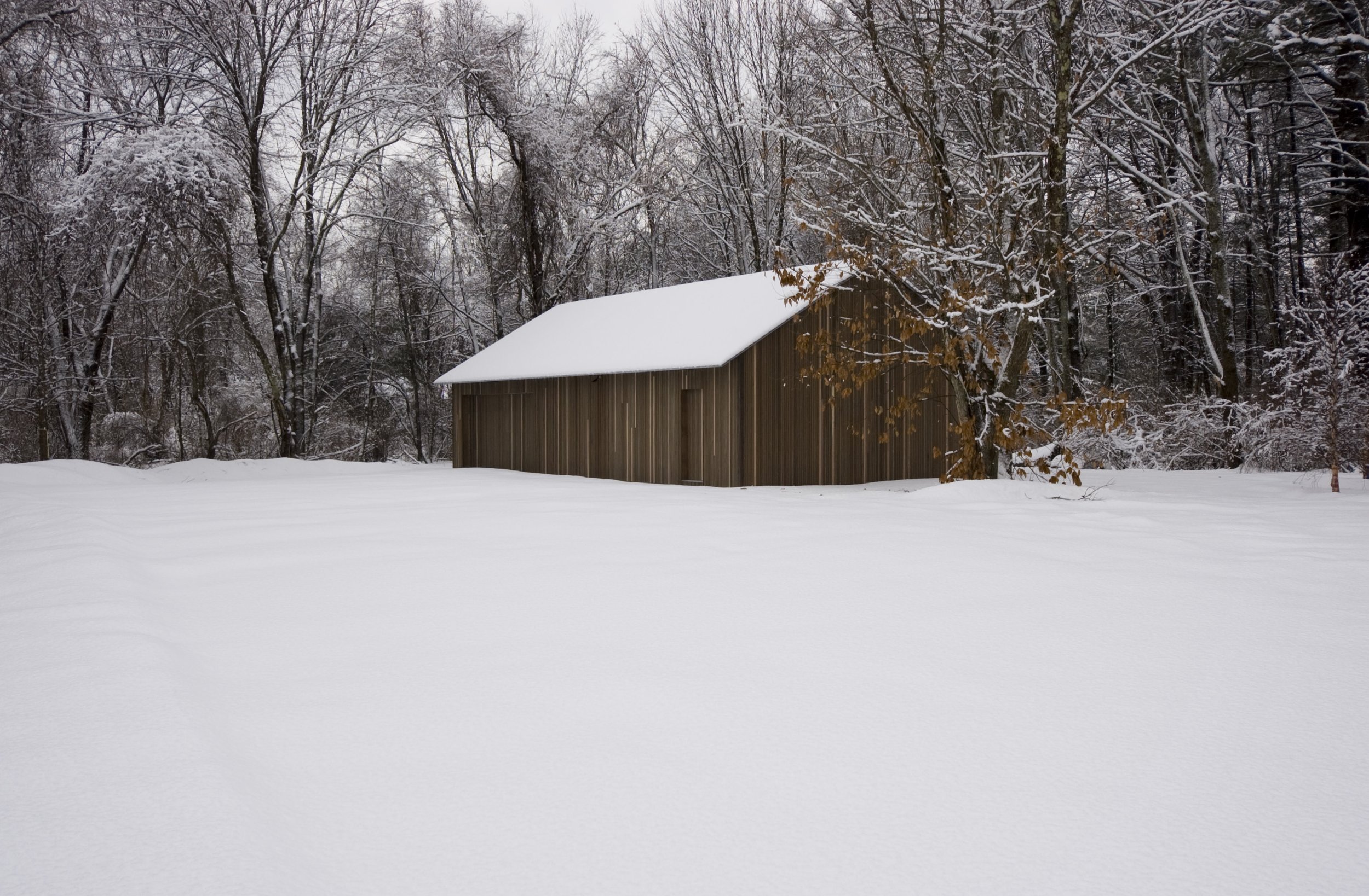   Cedar Barn      I        A simple storage and utility building camouflaged into the surrounding woodland