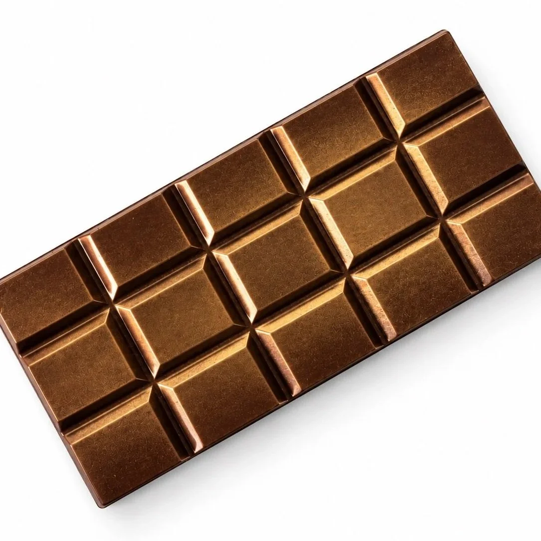 Dark chocolate rectangular bar finished with edible bronze lustre dust.